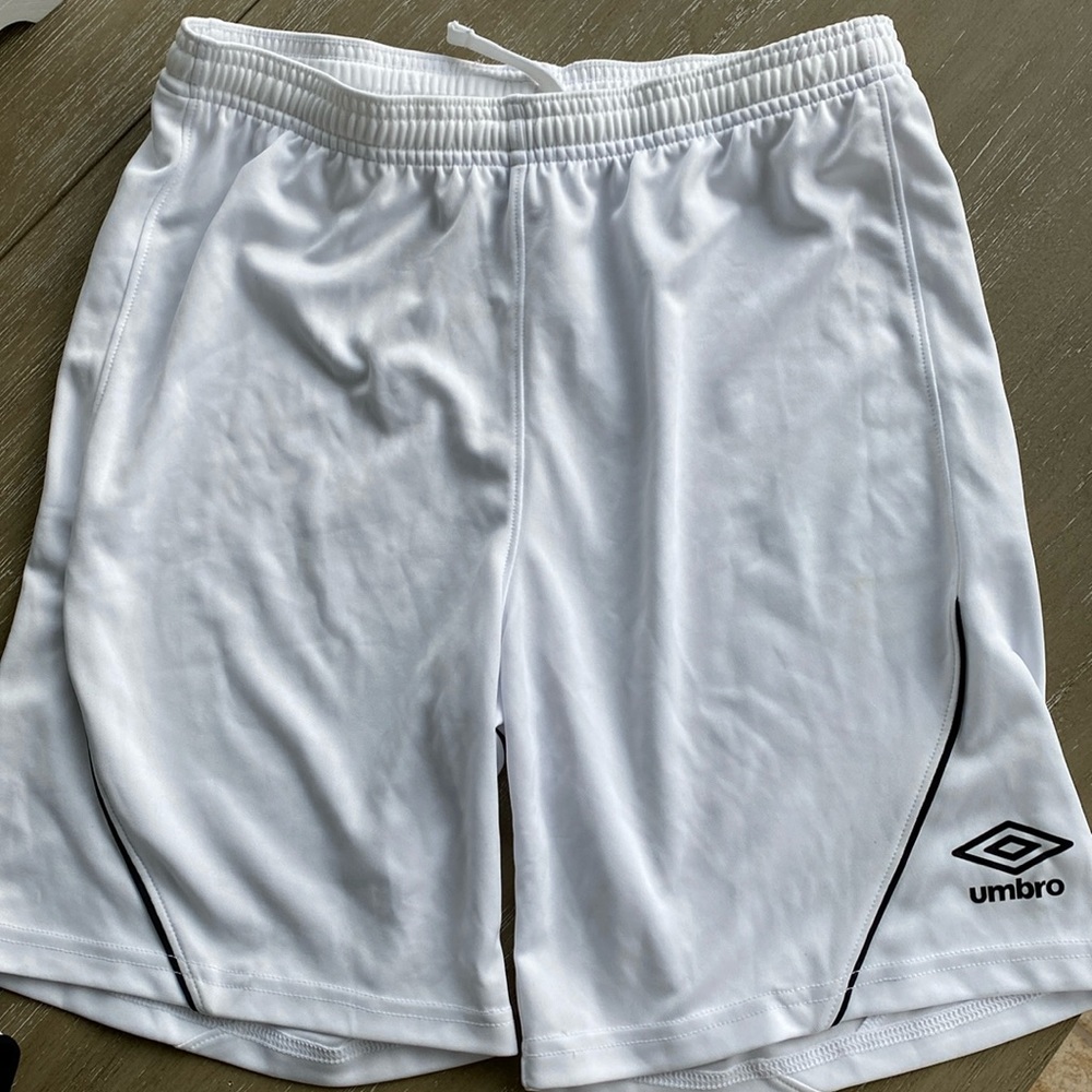 Umbro white soccer shorts.  Youth large. New with tags!